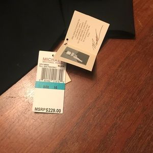 Women’s Michael Kors black blazer with buckle